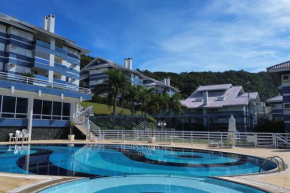 Apto c/ sacada e churrasqueira - Praia Brava, Florianópolis